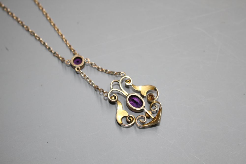 An Edwardian 9ct, amethyst and seed pearl set pendant necklace,